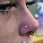 Bold and refined facial piercing by Jessica at Modify Tattoo and Piercing, Auckland—where artistry meets precision.