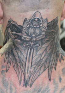 Powerful and evocative, George Lockhart's Angel Soldier tattoo embodies strength and grace in every detail.