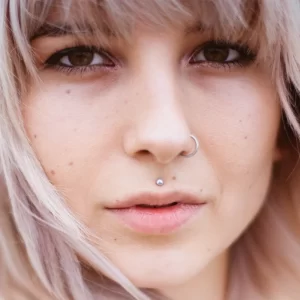 Woman facial piercing