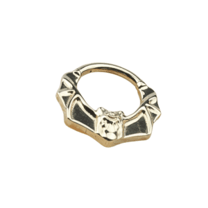 A sleek, gold PVD-plated titanium clicker ring with a smooth, flat design, ideal for daith or septum piercings.