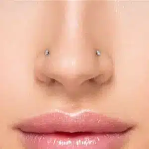 14kt white gold 2.0mm CZ nose screw with prong setting and right bend for healed nostril piercings