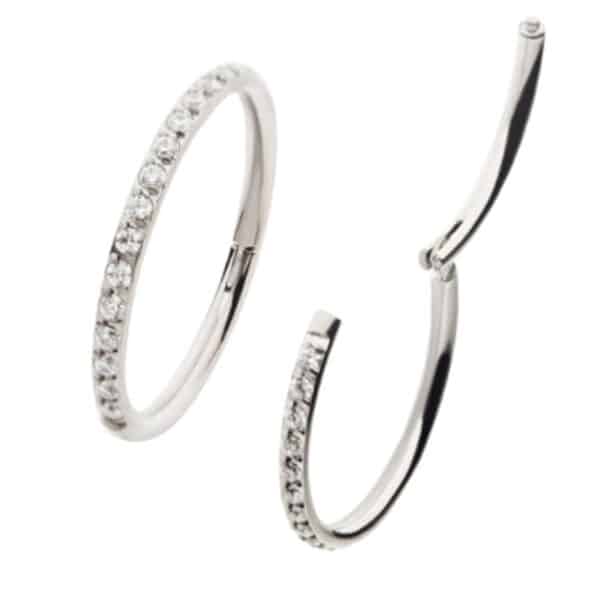 Silver 12mm titanium hinged ring with clear diamantes, suitable for healed conch or lobe piercings.