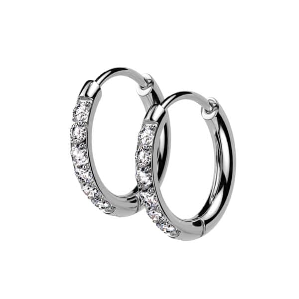Pair of GlimmerClick stainless steel hoop earrings with cubic zirconia jewels, silver 10mm hoops, 20G thickness.