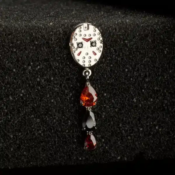 Titanium Jason Mask threadless piercing top with garnet and black gem dangle – Friday the 13th enamel design.
